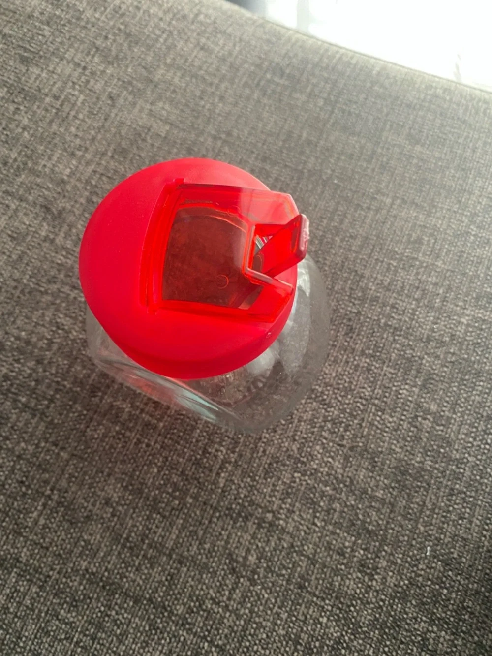 Clear Glass Honey Jar with Red Lid and Spoon